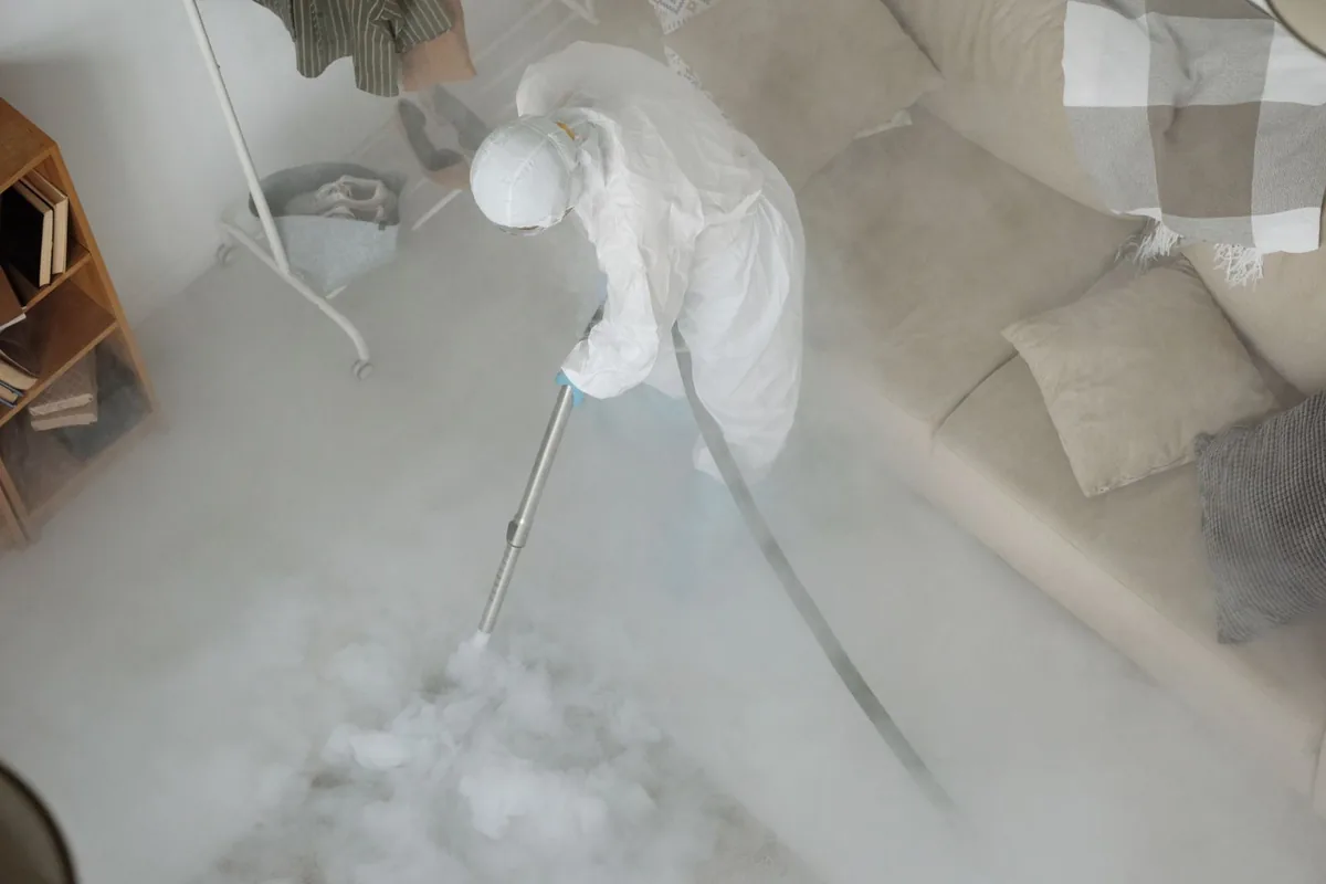 Biohazard cleanup technician in protective equipment, Yorkville, WI